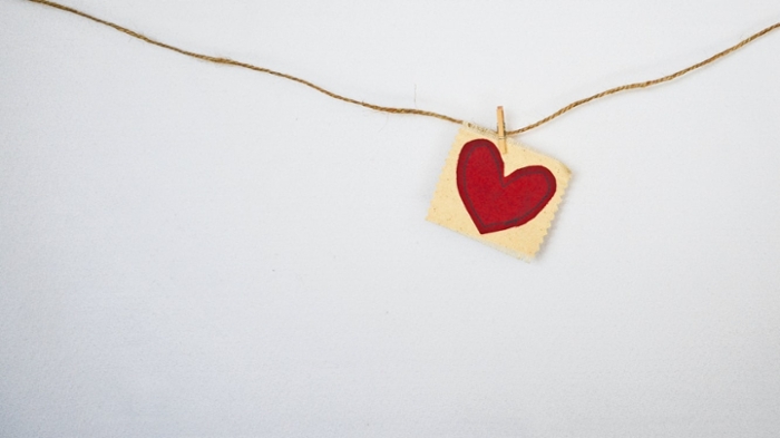 Paper heart on a string. 